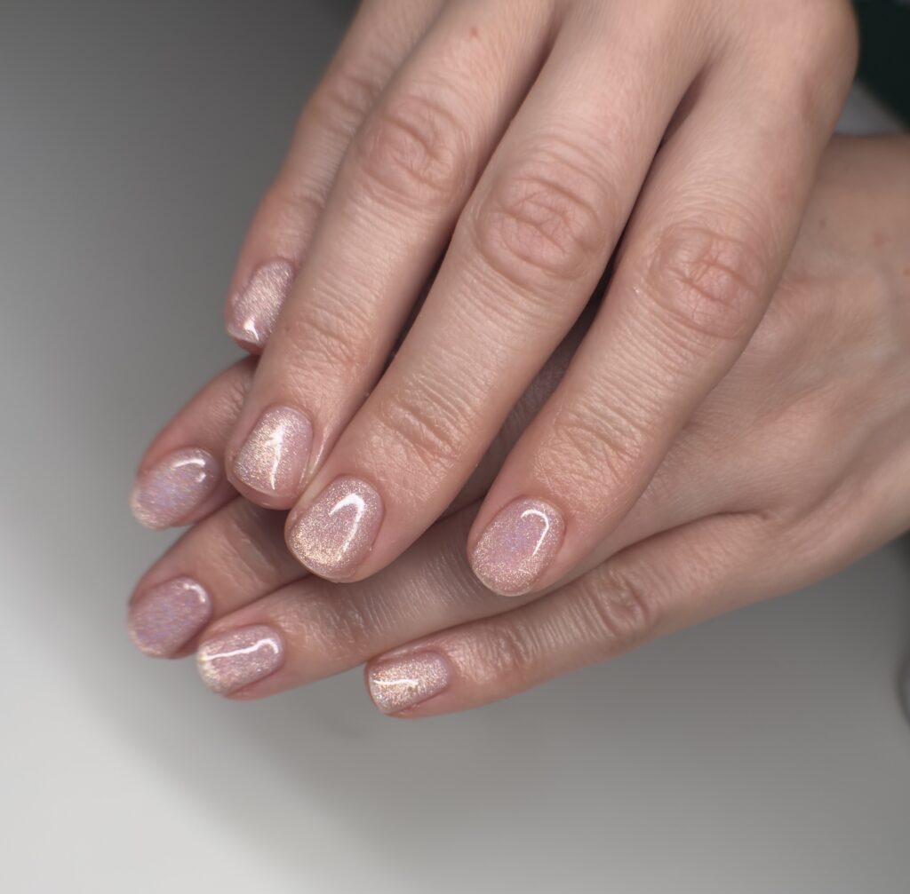 short nails with light color magnetic gel polish